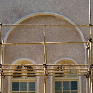 A building with scaffolding on the front of it