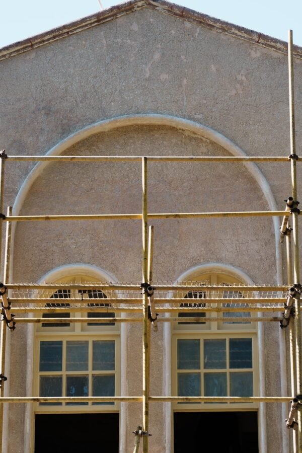 A building with scaffolding on the front of it